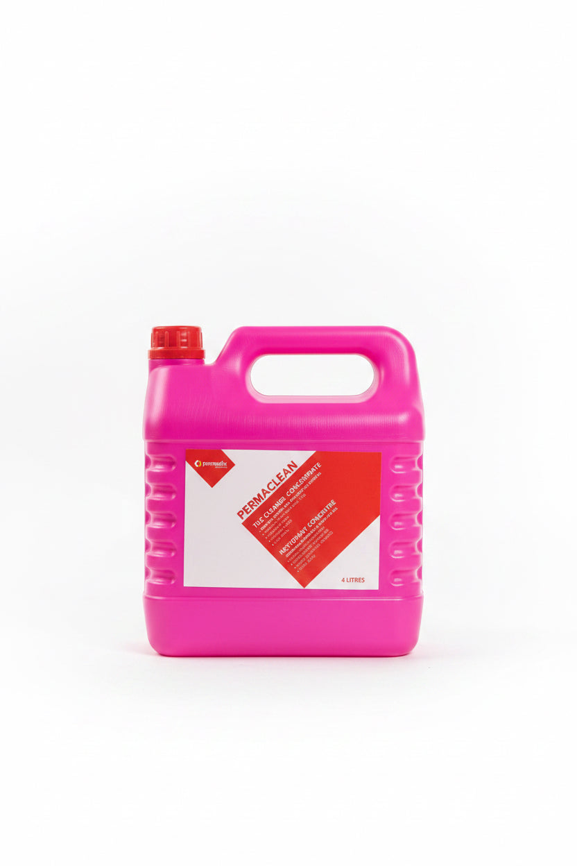 A large bright pink plastic container of Peraclean cleaning compound with a red cap, displayed on top of blue boxes in a cluttered storage or shop environment.