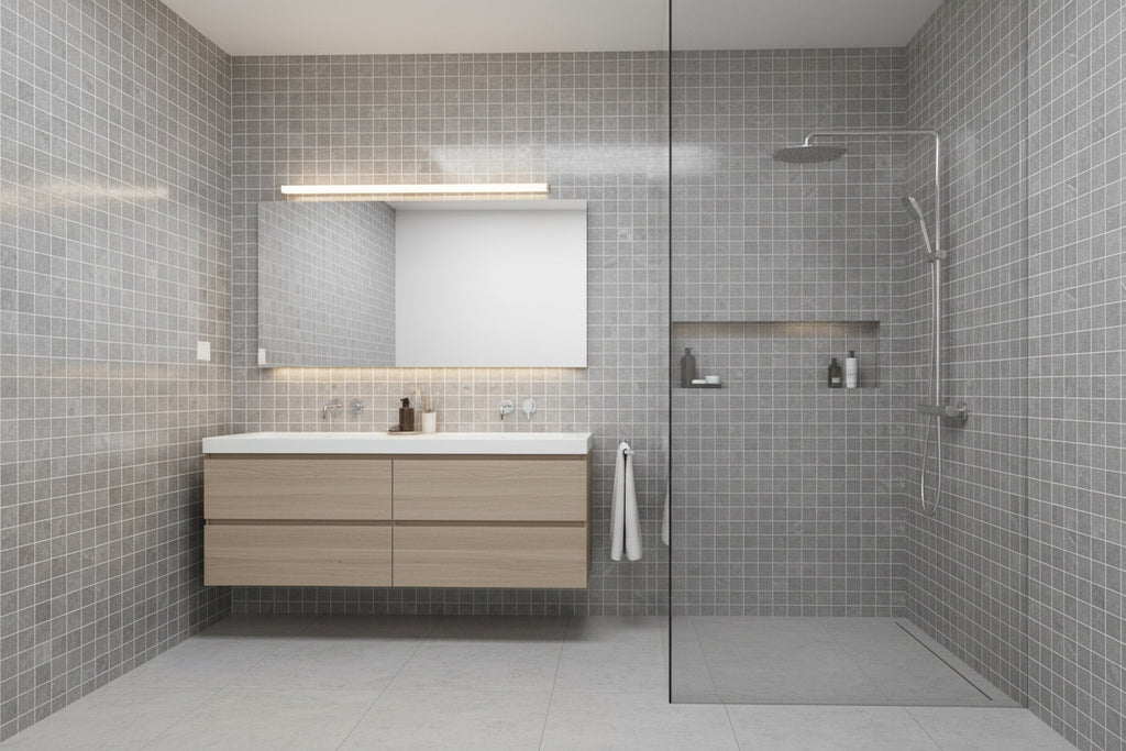 Gray mosaic tiles placed in the center. A white sheet and a rock are partially visible at the edges.