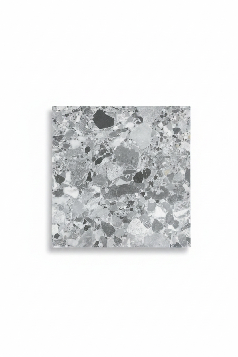 A square sample of gray and white terrazzo with black and light gray flecks, shown against a plain white background with a soft drop shadow.