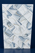A rectangular decorative tile or panel with a white base and a raised diamond grid pattern, featuring blue-gray marble veining with thin gold accents. The panel is photographed against a brown cardboard backing with an orange number '250044' printed at the top.